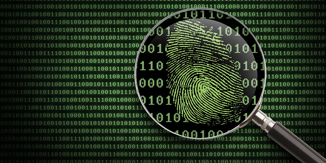 graphic of a magnifying glass over a thumbprint on a binary code background